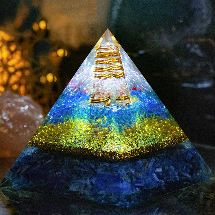 Piramide di orgone con guglia energetica in quarzo trasparente Olivenorma