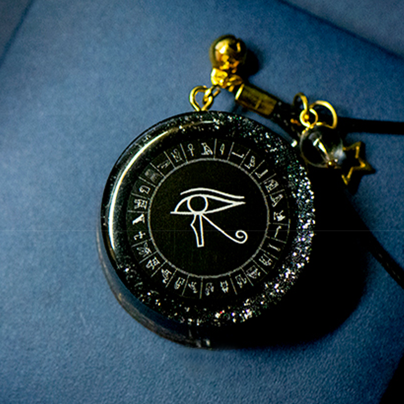 Collana di energia organica di ossidiana con occhio di Horus Olivenorma