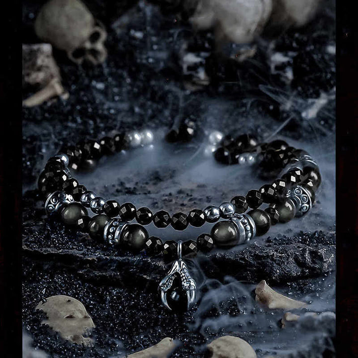 Bracciale Olivenorma con ciondolo a forma di artiglio del diavolo in perline di ossidiana d'argento 