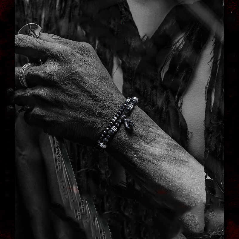 Bracciale Olivenorma con ciondolo a forma di artiglio del diavolo in perline di ossidiana d'argento 