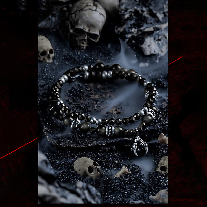 Bracciale Olivenorma con ciondolo a forma di artiglio del diavolo in perline di ossidiana d'argento 