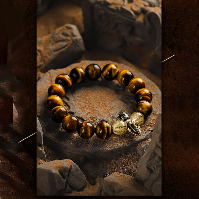 Bracciale Olivenorma con perline in quarzo rutilato color oro e occhio di tigre 