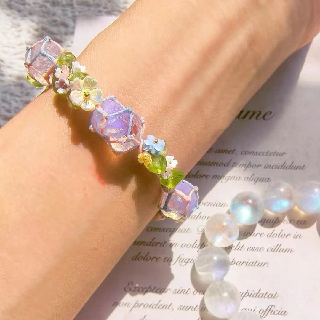 Bracciale intrecciato con fiori di cristallo opalite peridoto Olivenorma 