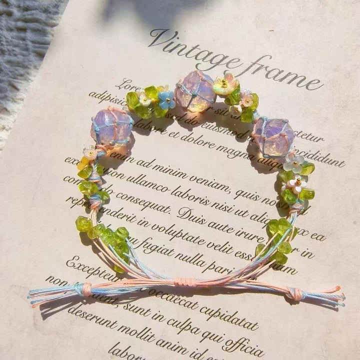 Bracciale intrecciato con fiori di cristallo opalite peridoto Olivenorma 