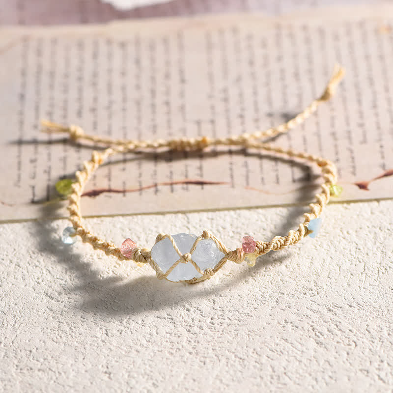 Braccialetto artigianale Olivenorma con fiori intrecciati in cristallo naturale