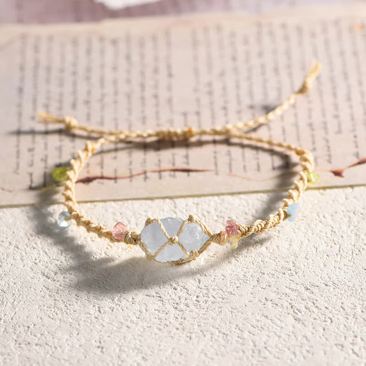 Braccialetto artigianale Olivenorma con fiori intrecciati in cristallo naturale