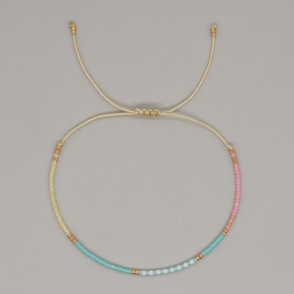 Olivenorma Braccialetto con coulisse in perline di riso colorate 