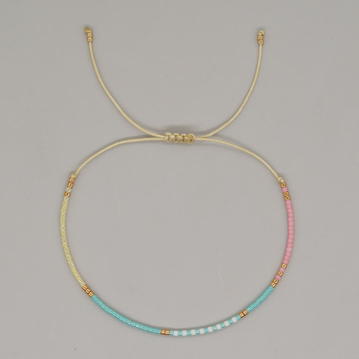 Olivenorma Braccialetto con coulisse in perline di riso colorate 