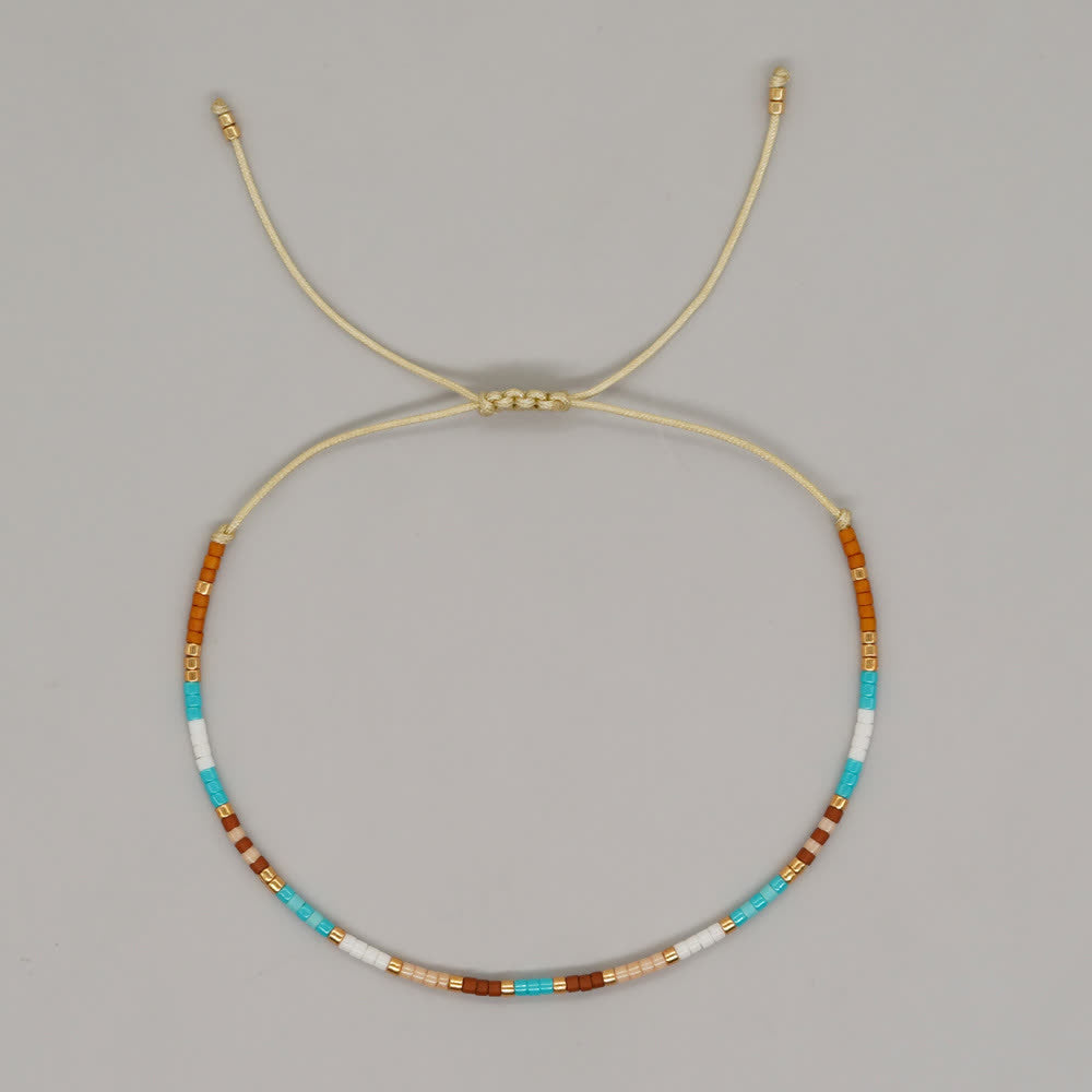 Olivenorma Braccialetto con coulisse in perline di riso colorate 