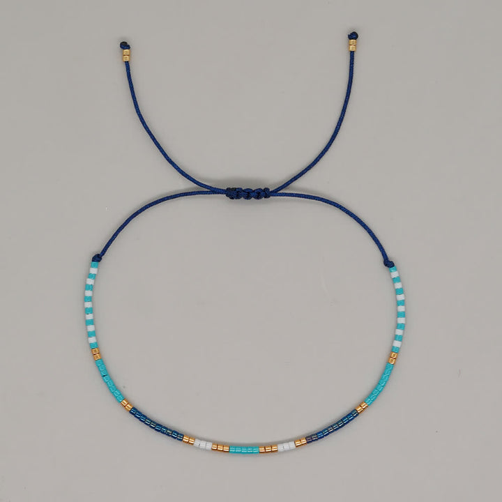 Olivenorma Braccialetto con coulisse in perline di riso colorate 