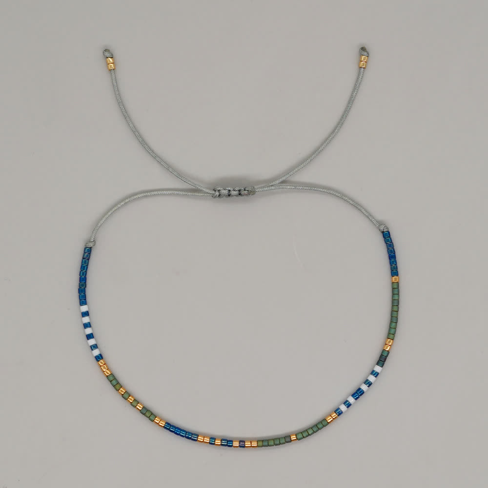 Olivenorma Braccialetto con coulisse in perline di riso colorate 