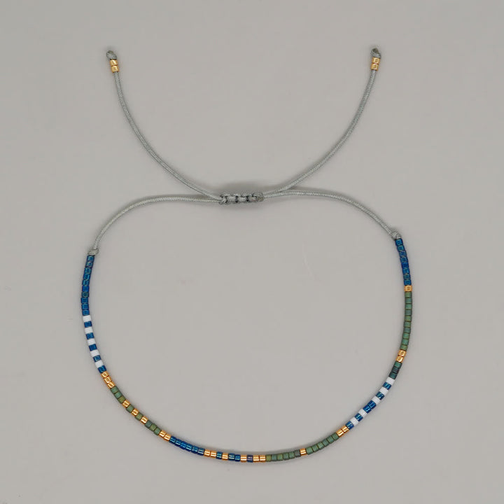 Olivenorma Braccialetto con coulisse in perline di riso colorate 