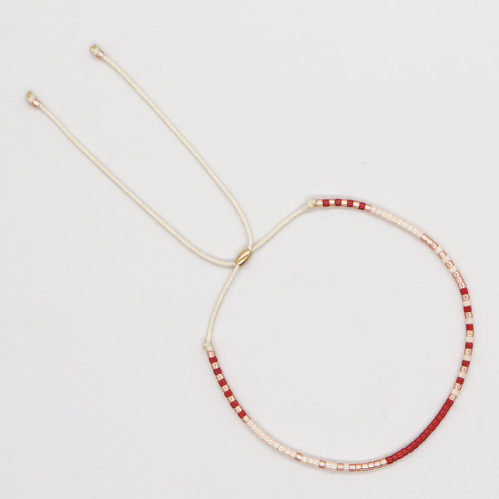 Olivenorma Braccialetto con coulisse beige con perline di riso colorate 