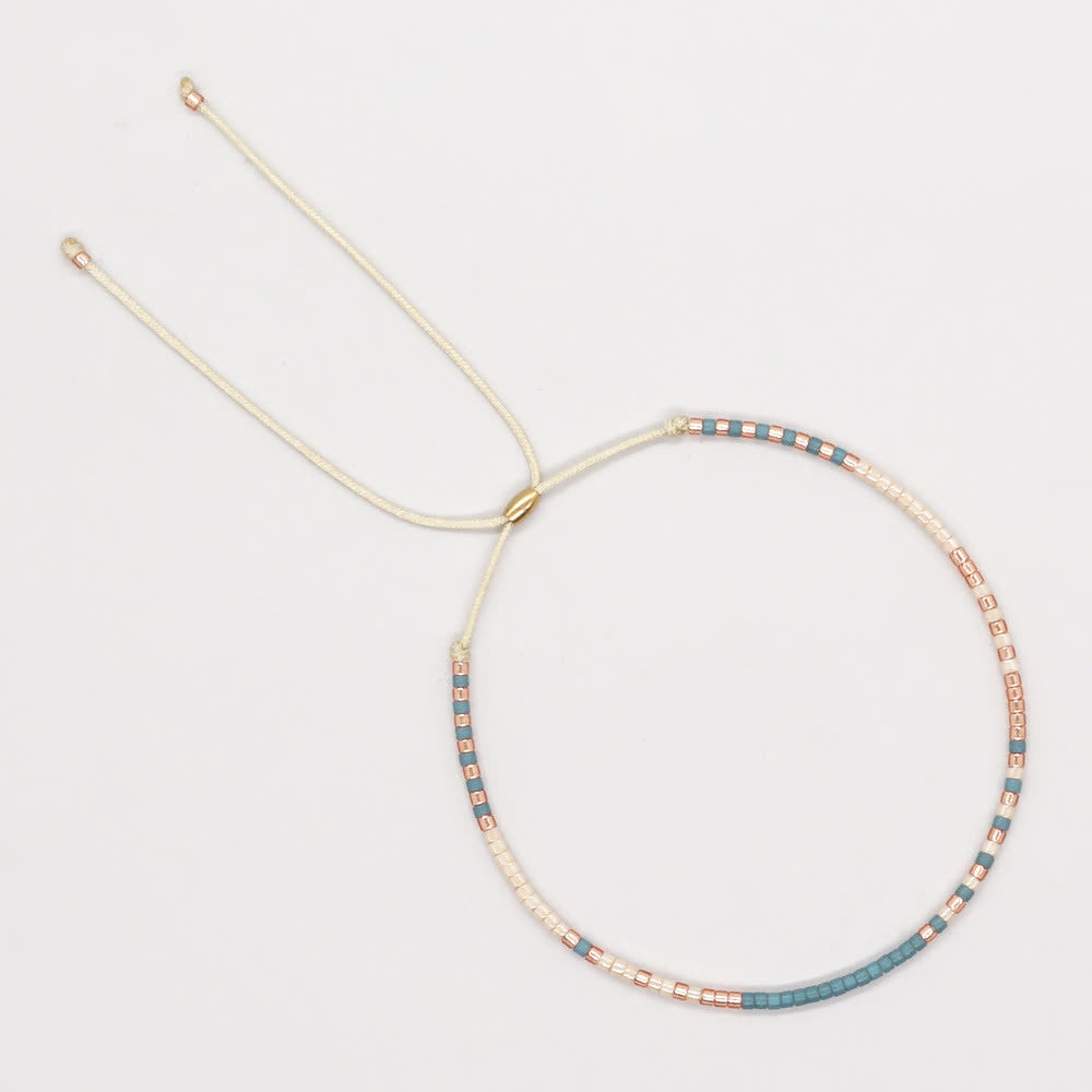 Olivenorma Braccialetto con coulisse beige con perline di riso colorate 