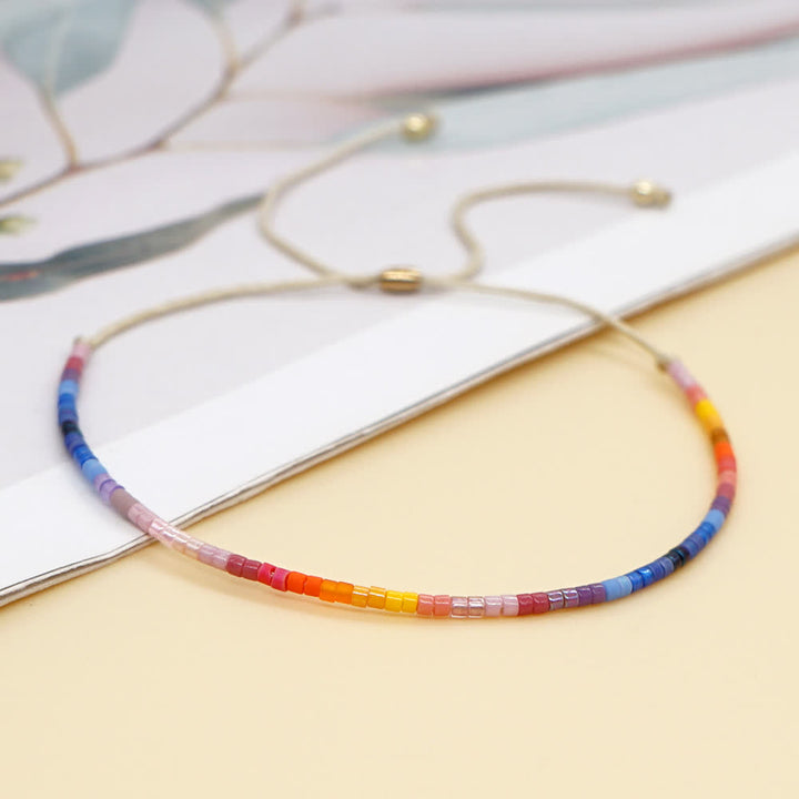 Olivenorma Braccialetto con coulisse beige con perline di riso colorate 