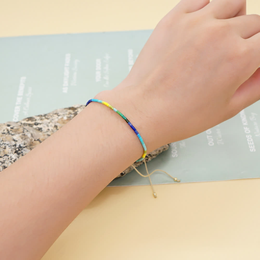 Olivenorma Braccialetto con coulisse beige con perline di riso colorate 