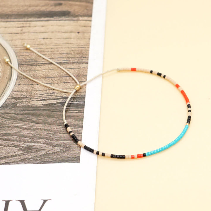 Olivenorma Braccialetto con coulisse beige con perline di riso colorate 