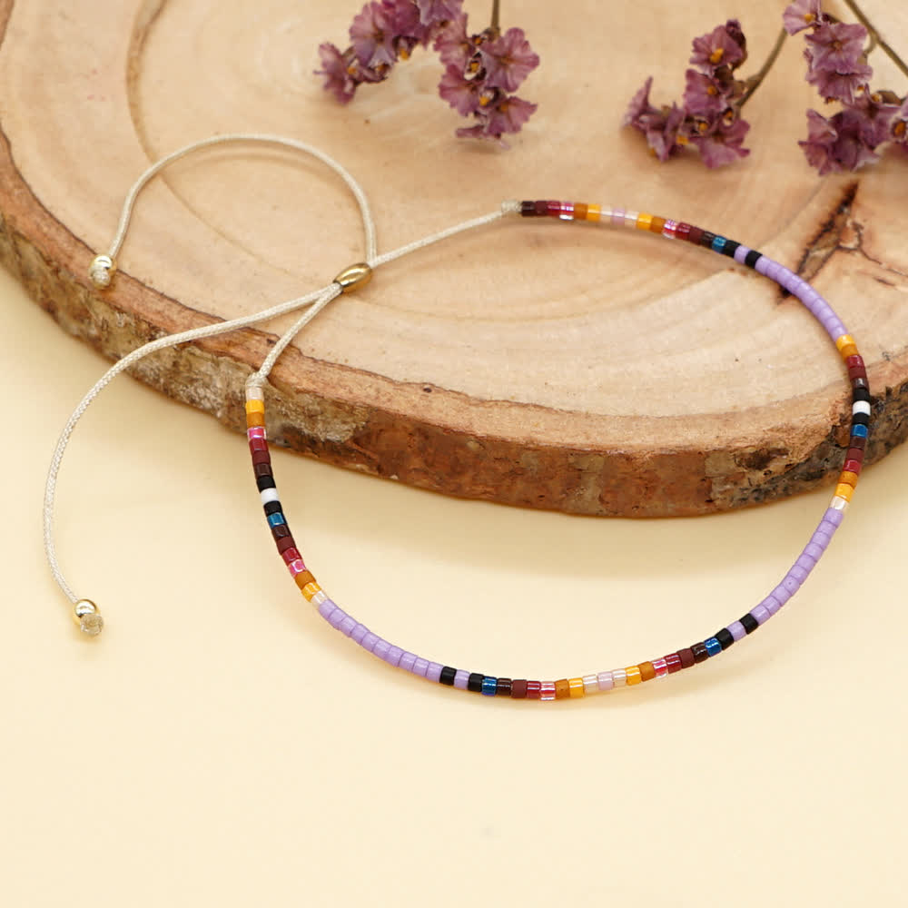 Olivenorma Braccialetto con coulisse beige con perline di riso colorate 