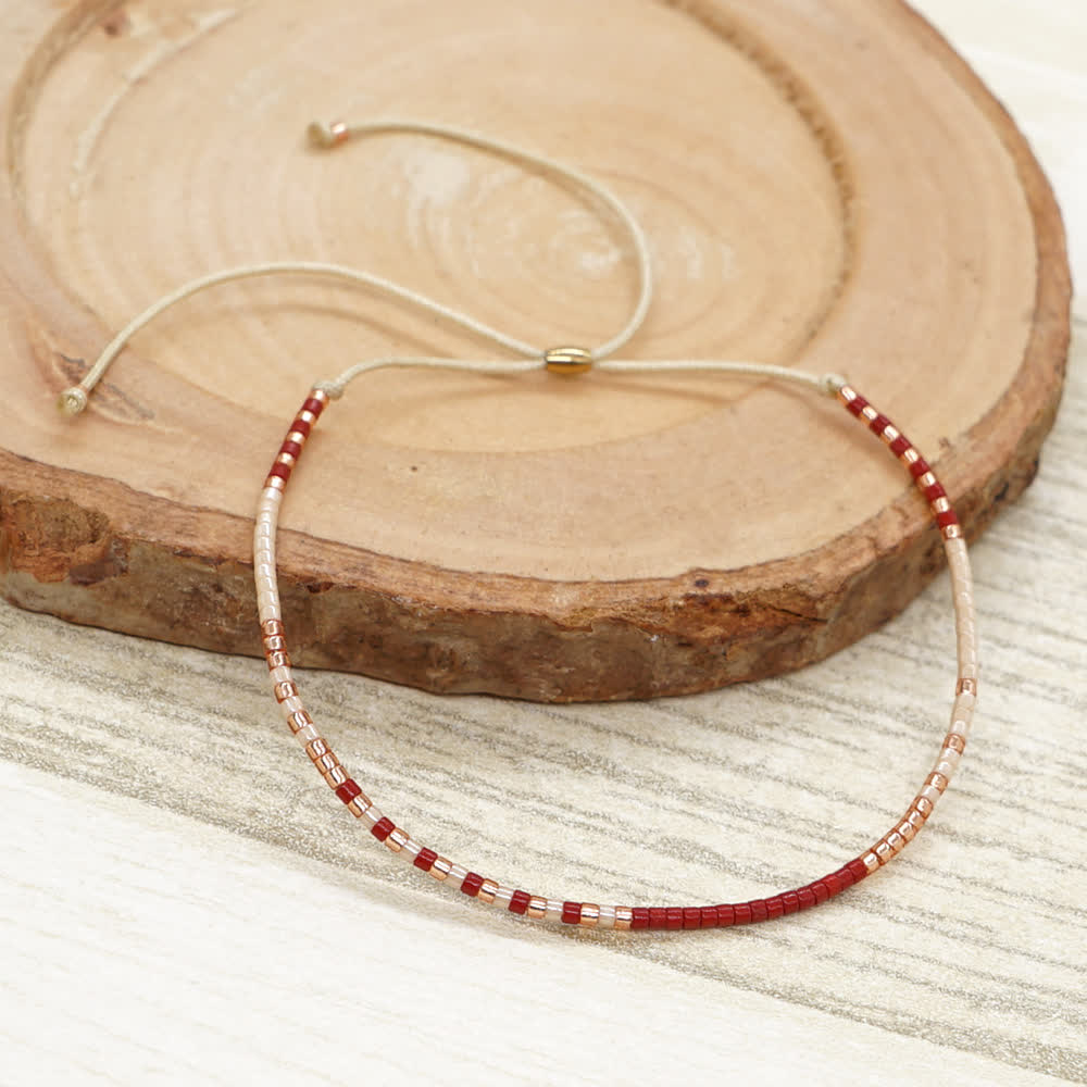 Olivenorma Braccialetto con coulisse beige con perline di riso colorate 