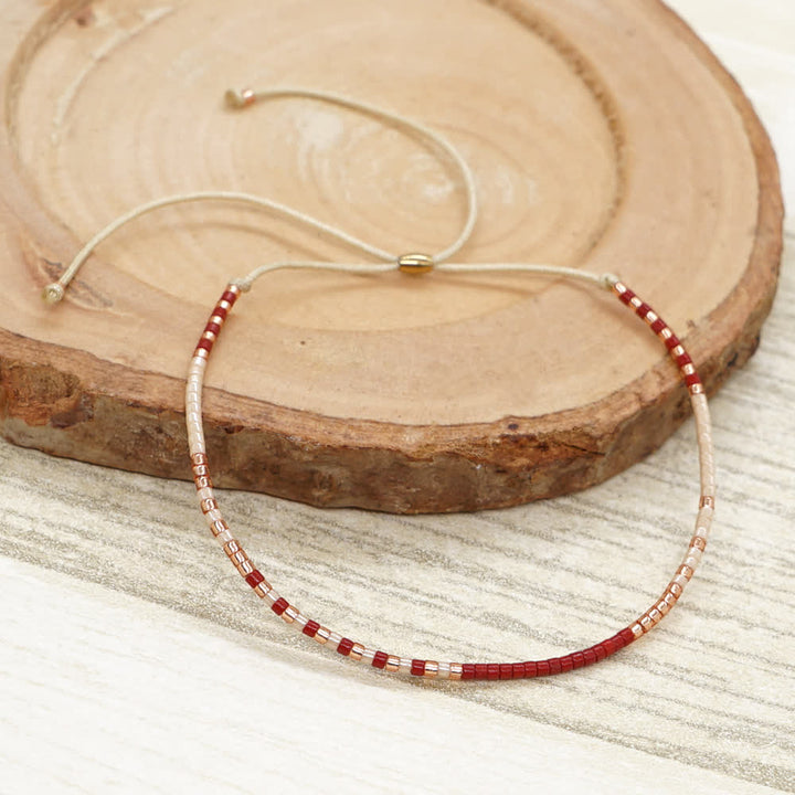 Olivenorma Braccialetto con coulisse beige con perline di riso colorate 