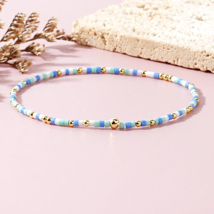 Olivenorma Braccialetto di perline di riso colorate 