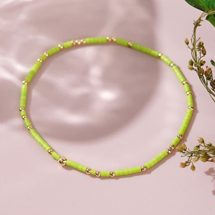 Olivenorma Braccialetto di perline di riso colorate 