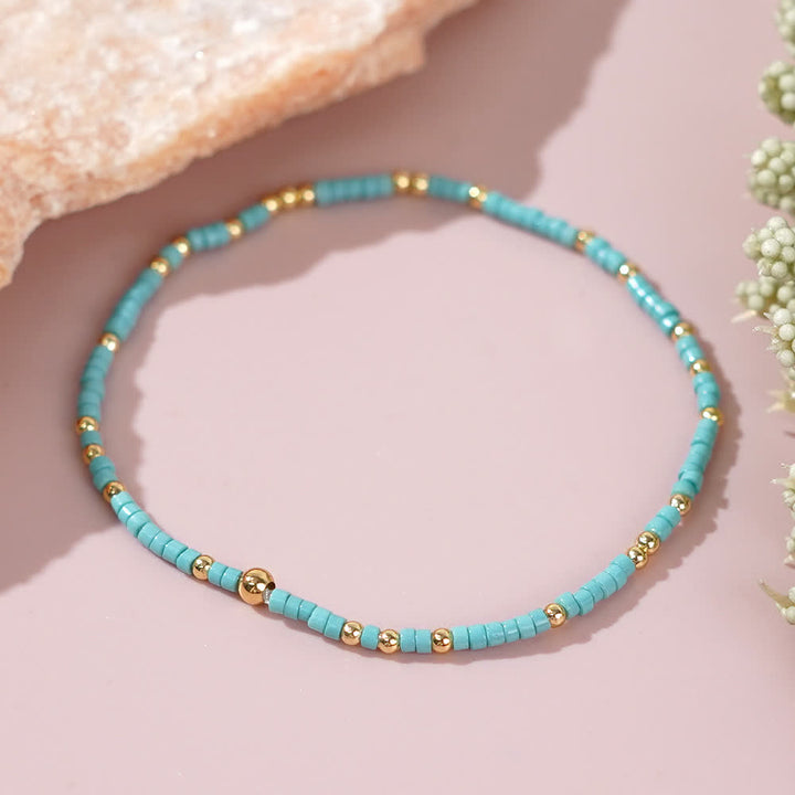 Olivenorma Braccialetto di perline di riso colorate 