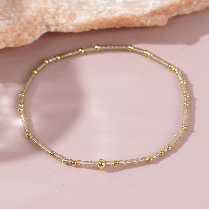 Olivenorma Braccialetto di perline di riso colorate 