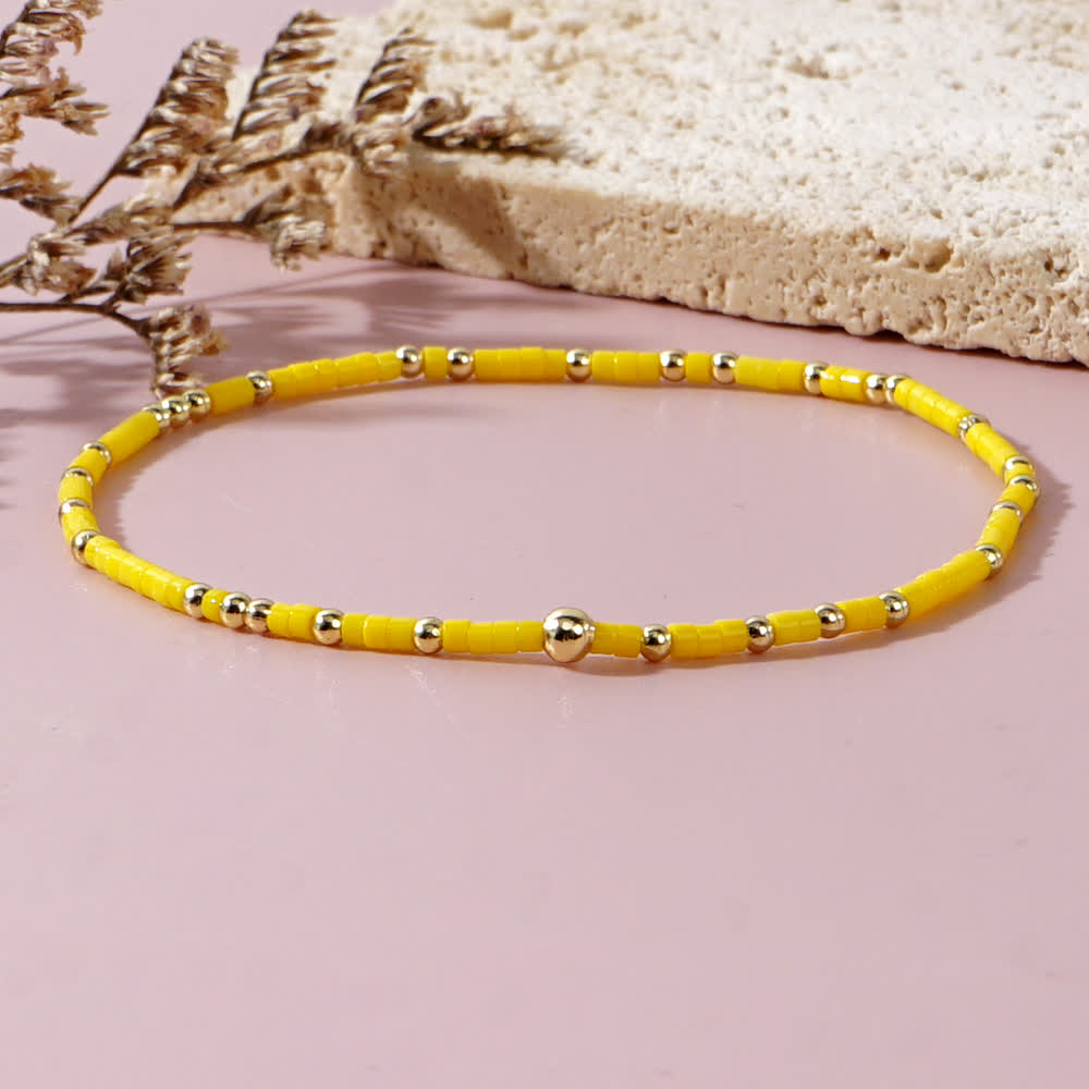 Olivenorma Braccialetto di perline di riso colorate 