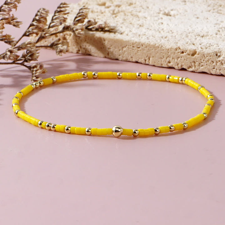 Olivenorma Braccialetto di perline di riso colorate 