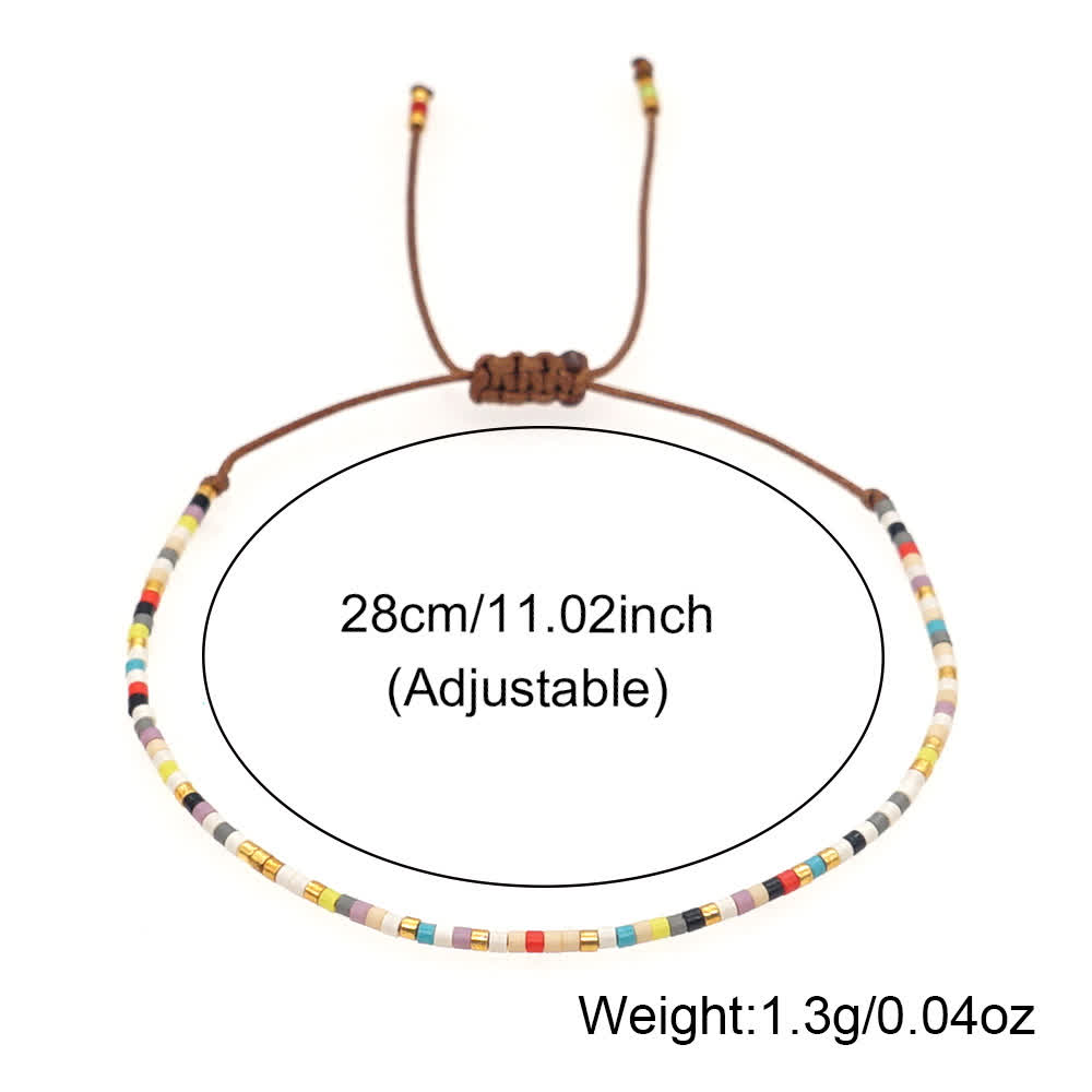 Olivenorma Braccialetto intrecciato marrone con perline di riso colorate 