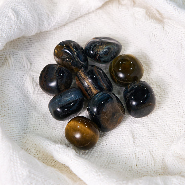 Pietra curativa burattata naturale di occhio di tigre blu Olivenorma