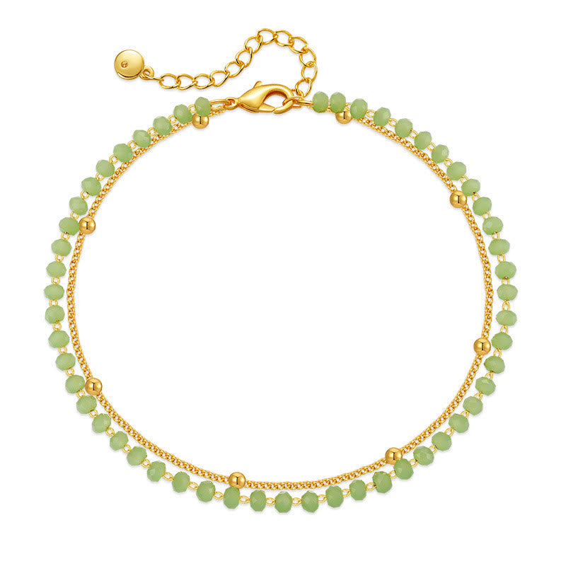 Olivenorma Cavigliera con perline placcata in oro e peridoto naturale