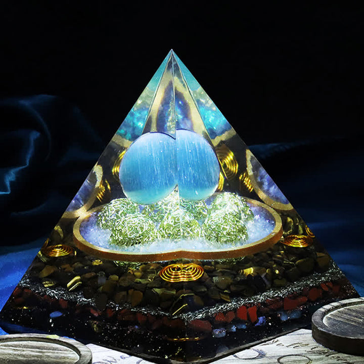 Olivenorma 14cm Piramide di Orgone in Pietra Occhio di Gatto Blu