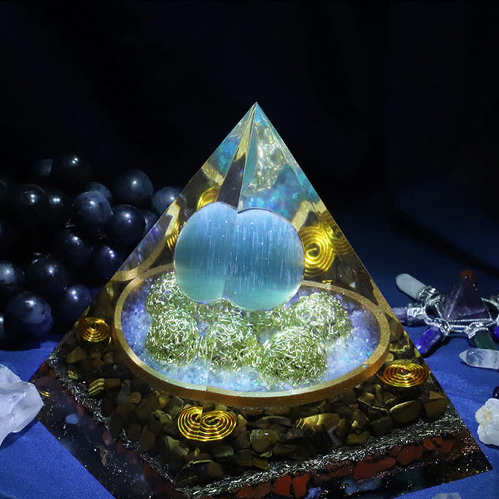 Olivenorma 14cm Piramide di Orgone in Pietra Occhio di Gatto Blu
