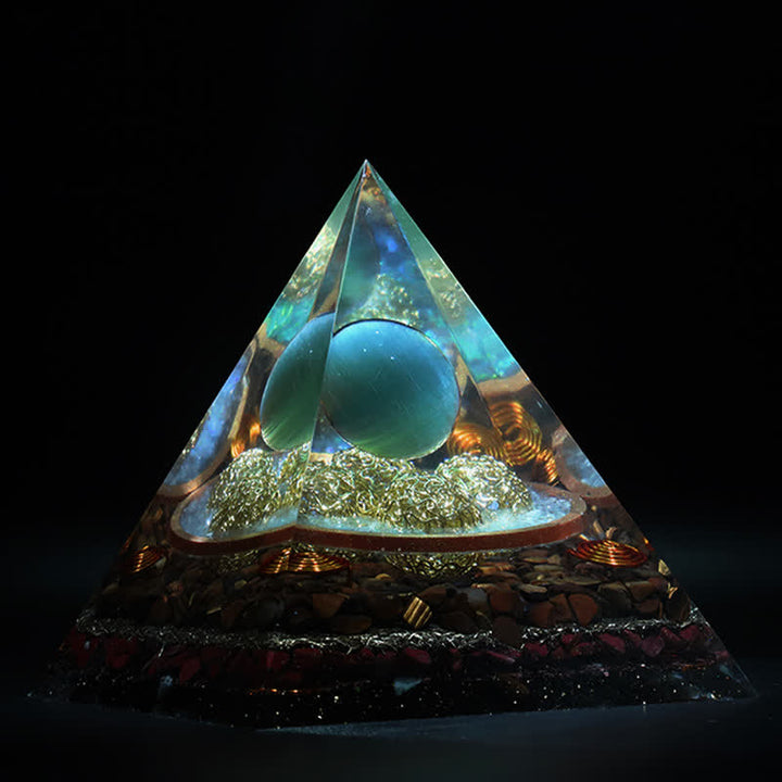 Olivenorma 14cm Piramide di Orgone in Pietra Occhio di Gatto Blu