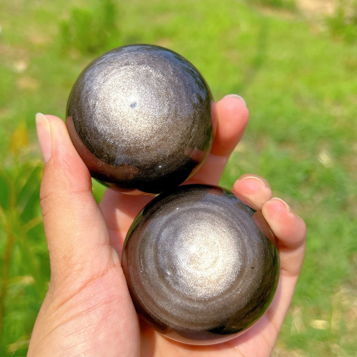 Sfera di cristallo di ossidiana argentata naturale Olivenorma