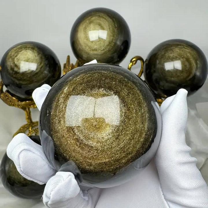 Sfera di cristallo di ossidiana dorata naturale Olivenorma