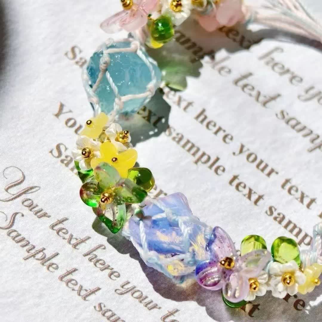 Bracciale intrecciato in cristallo di opalite, quarzo rosa e acquamarina Olivenorma 