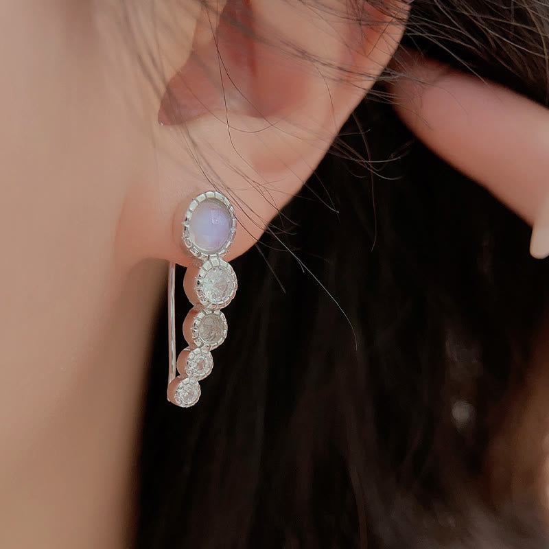 Orecchini Olivenorma con pietra di luna rotonda e zircone bianco
