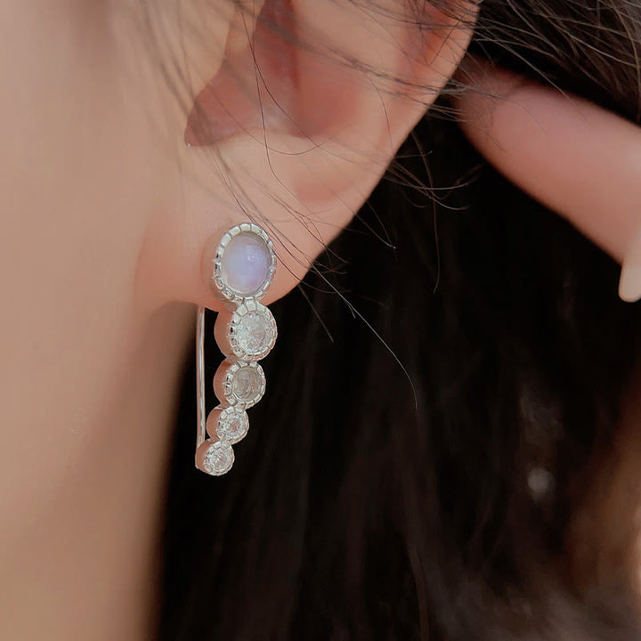 Orecchini Olivenorma con pietra di luna rotonda e zircone bianco