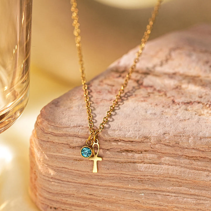 Olivenorma Collana con ciondolo con simbolo Hamsa e croce in acquamarina e occhio maligno