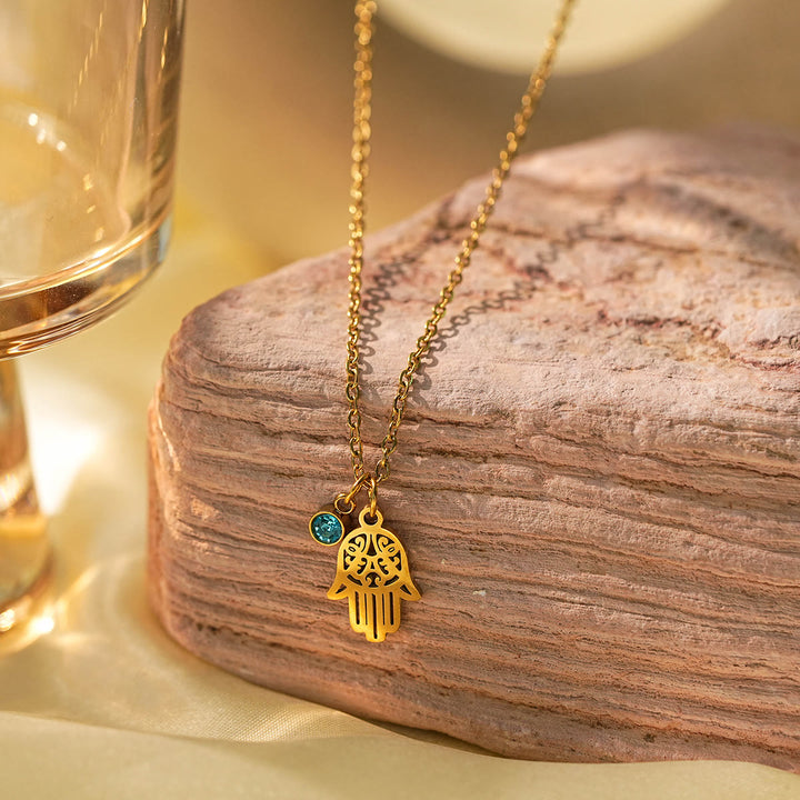 Olivenorma Collana con ciondolo con simbolo Hamsa e croce in acquamarina e occhio maligno