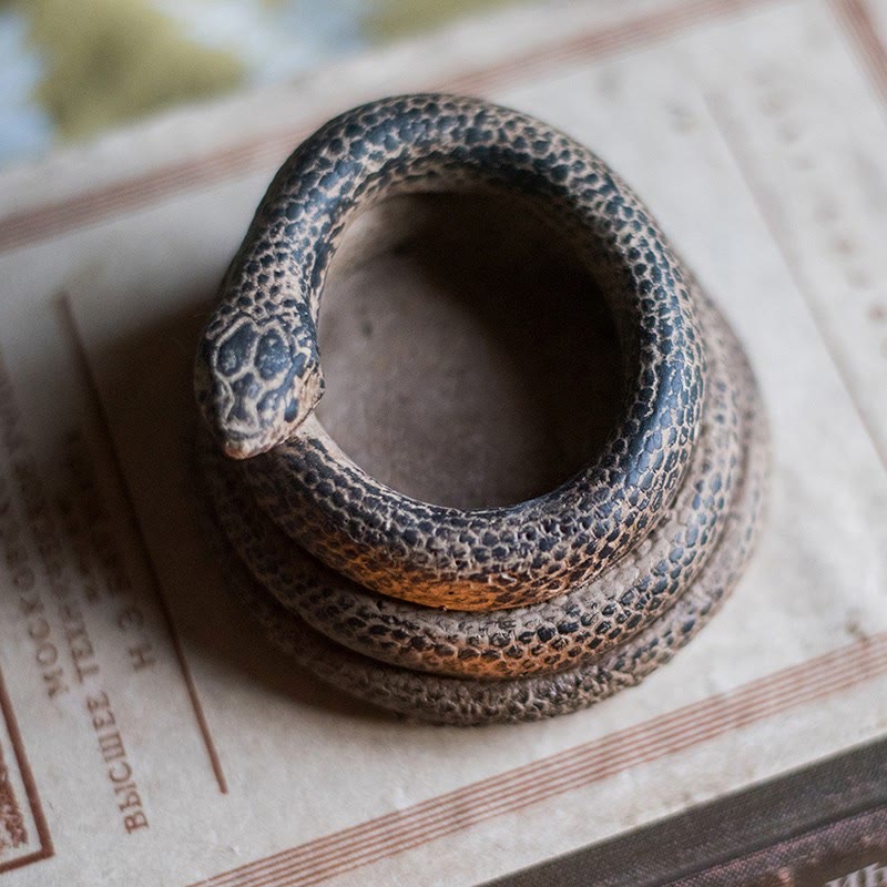 Portacandele realistico a forma di serpente arrotolato Olivenorma