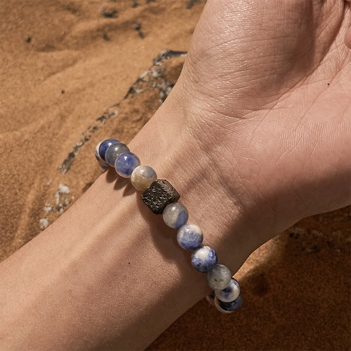 Bracciale di perline in sodalite blu con pietra lavica naturale Olivenorma