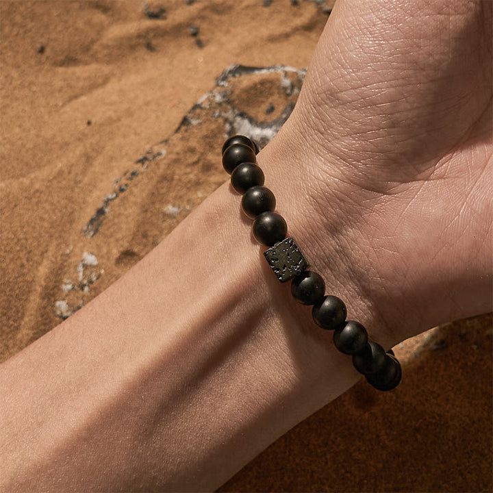Bracciale Olivenorma in pietra lavica e onice nero da 8 mm