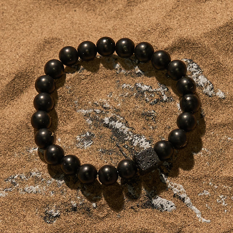 Bracciale Olivenorma in pietra lavica e onice nero da 8 mm
