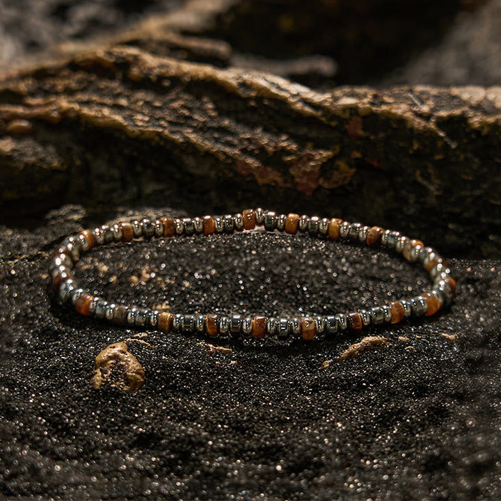 Braccialetto di perline di ematite con occhio di tigre e perline sul rullo Olivenorma