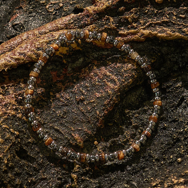 Braccialetto di perline di ematite con occhio di tigre e perline sul rullo Olivenorma