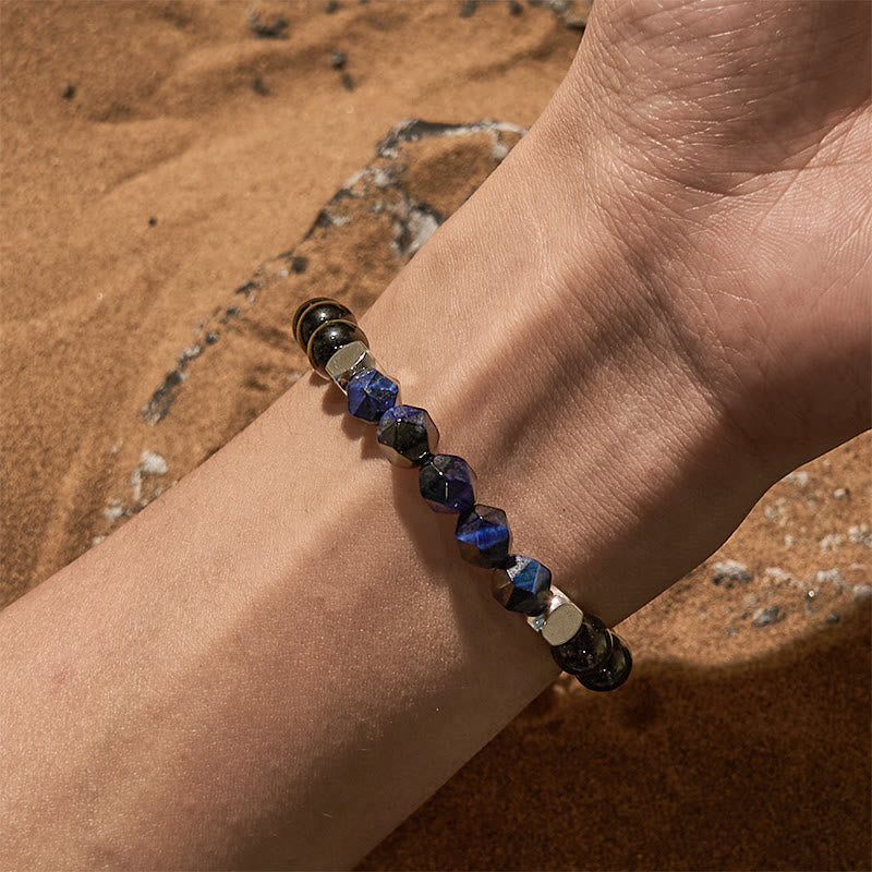 Bracciale Olivenorma in perline di ossidiana blu sfaccettata con occhio di tigre
